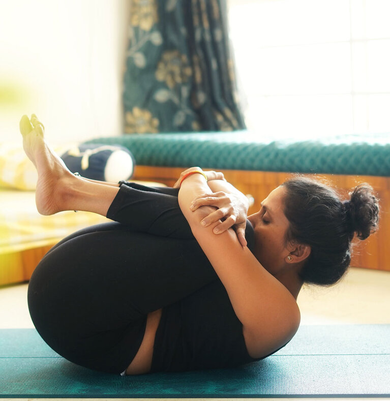 Vidya Kale in a restorative yoga pose